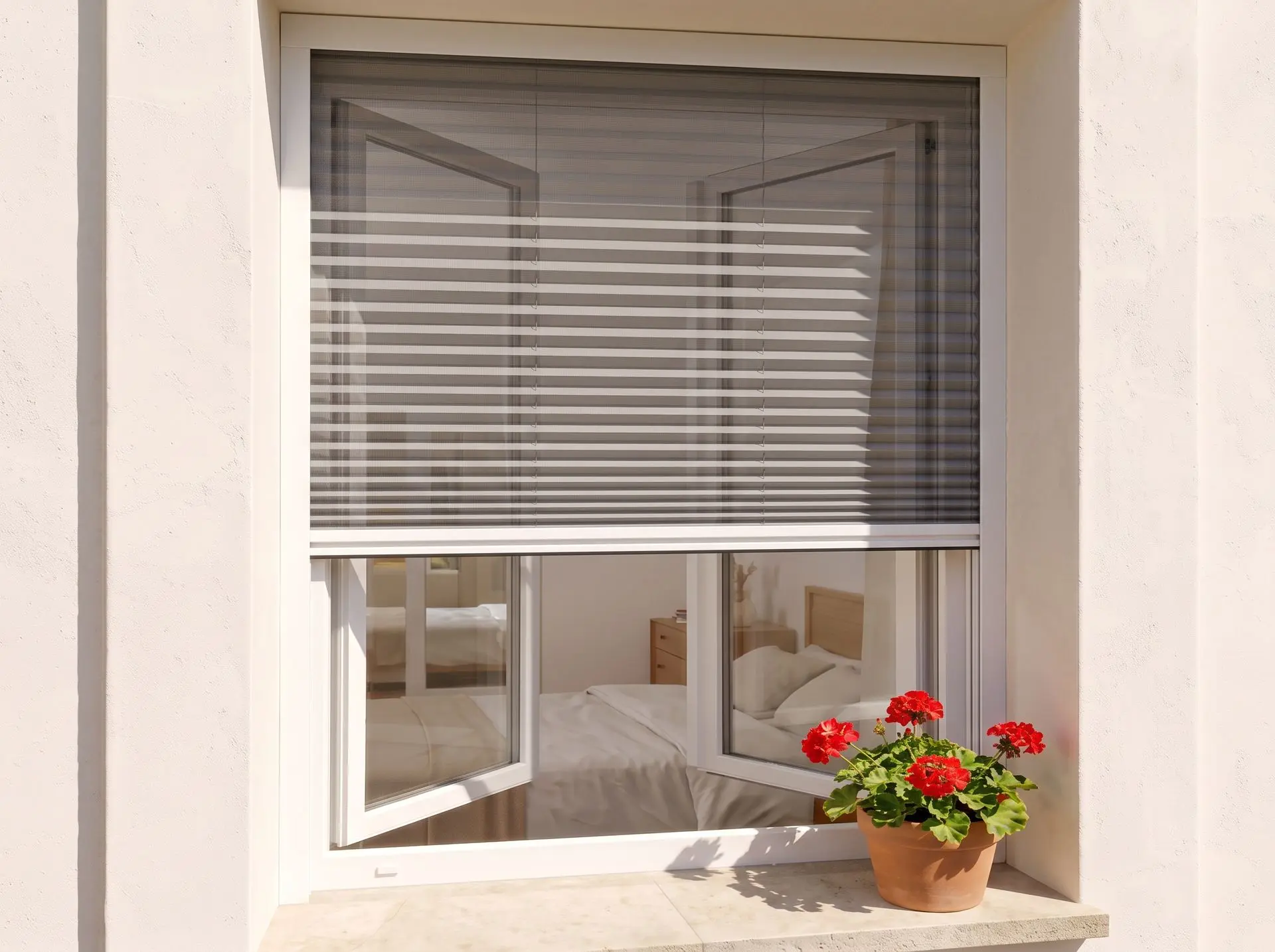 Mosquitera plisada en una ventana, instalada por fuera y bajada hasta la mitad